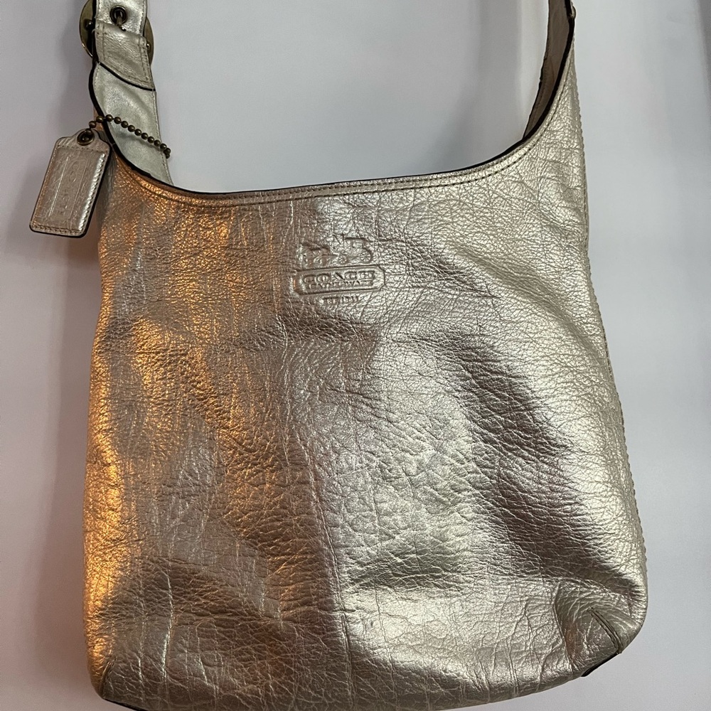 Coach cross body bag in soft gold leather